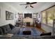 Cozy living room with fireplace, built-in bookshelves, and comfortable seating at 216 W South Ave, Tampa, FL 33603