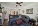 Spacious living room with a comfortable couch, soft rug, and stylish decor, ideal for relaxing and entertaining guests at 216 W South Ave, Tampa, FL 33603