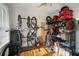 Well-lit storage room with hardwood floors, bikes, and plenty of storage shelves at 216 W South Ave, Tampa, FL 33603