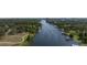 Aerial view of the waterfront with docks and boats in the surrounding neighborhood at 216 W South Ave, Tampa, FL 33603