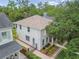 Aerial view of home showcasing the roof, landscaping, hardscape, and proximity to surrounding neighborhood at 2522 W Watrous Ave, Tampa, FL 33629