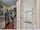 Bathroom featuring a walk-in closet and a tiled shower at 2522 W Watrous Ave, Tampa, FL 33629