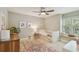 Bright bedroom with ceiling fan and natural light at 2522 W Watrous Ave, Tampa, FL 33629