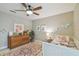 Bright bedroom with ceiling fan and natural light at 2522 W Watrous Ave, Tampa, FL 33629