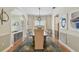 Open dining room featuring seating for eight, modern decor, and plenty of natural light at 2522 W Watrous Ave, Tampa, FL 33629