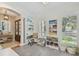 Charming playroom with decorative shelving, toys, and abundant natural light from the large windows at 2522 W Watrous Ave, Tampa, FL 33629
