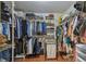 Organized walk-in closet with ample storage for clothes, shoes, and accessories at 2522 W Watrous Ave, Tampa, FL 33629
