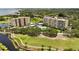 Gorgeous aerial view of condominiums and lush greenery surrounding the property at 2616 Cove Cay Dr # 505, Clearwater, FL 33760