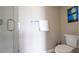 Modern bathroom with glass-enclosed shower and toilet at 2616 Cove Cay Dr # 505, Clearwater, FL 33760