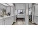 Bright bedroom featuring a large window with beautiful views seen from the bathroom at 2616 Cove Cay Dr # 505, Clearwater, FL 33760