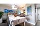 Inviting dining room featuring a decorative table setting, beach accents, and warm lighting at 2616 Cove Cay Dr # 505, Clearwater, FL 33760