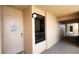 Neutral hallway with a unit entrance, lighting, and windows at 2616 Cove Cay Dr # 505, Clearwater, FL 33760