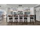 Kitchen area with bar seating, modern appliances, and ample counter space at 2616 Cove Cay Dr # 505, Clearwater, FL 33760