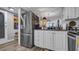 Efficient kitchen layout with stainless appliances, modern lighting, and breakfast nook at 2616 Cove Cay Dr # 505, Clearwater, FL 33760