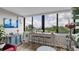 Bright living area with a table overlooking lush scenery at 2616 Cove Cay Dr # 505, Clearwater, FL 33760