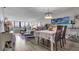 Spacious living and dining room with a big window overlooking the water at 2616 Cove Cay Dr # 505, Clearwater, FL 33760