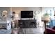 Comfortable living room features modern decor, a large TV, and stylish furniture for relaxation at 2616 Cove Cay Dr # 505, Clearwater, FL 33760