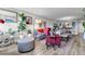 Open-concept living space seamlessly connecting to the dining area with modern decor at 2616 Cove Cay Dr # 505, Clearwater, FL 33760