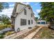 Charming two-story home with blue sky at 310 N Lincoln Ave, Clearwater, FL 33755