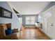 Bright foyer with hardwood floors, staircase, and transom window in the front door at 310 N Lincoln Ave, Clearwater, FL 33755