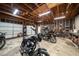 This spacious garage has space to work on vehicles, with work benches and exposed wooden beams at 310 N Lincoln Ave, Clearwater, FL 33755