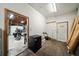 A look into a detached garage with a door to the backyard and space to work on projects at 310 N Lincoln Ave, Clearwater, FL 33755