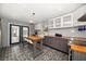 Stylish kitchen with patterned floors, center island, white subway tile, and gray cabinets at 310 N Lincoln Ave, Clearwater, FL 33755
