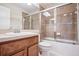 Well-maintained bathroom with tile shower and modern sink vanity at 31215 Flannery Ct, Wesley Chapel, FL 33543