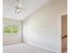 Bright bedroom featuring a ceiling fan, closet, and window with a backyard view at 31215 Flannery Ct, Wesley Chapel, FL 33543