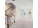 Open floorplan showcasing the living room and staircase at 31215 Flannery Ct, Wesley Chapel, FL 33543
