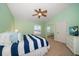 Bedroom featuring a ceiling fan, and plenty of natural light and neutral-colored walls at 3397 Bluefish Dr, Hernando Beach, FL 34607