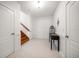 Bright foyer featuring a staircase and console table at 3397 Bluefish Dr, Hernando Beach, FL 34607