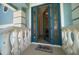 A beautiful blue front door with glass opens to a lovely home at 3397 Bluefish Dr, Hernando Beach, FL 34607