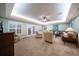 Spacious living room with a ceiling fan, recessed lighting, and French doors at 3397 Bluefish Dr, Hernando Beach, FL 34607