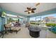 Enclosed outdoor living space with pool views at 3397 Bluefish Dr, Hernando Beach, FL 34607