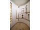 Tiled walk-in shower with tiled floors, body spray jets and unique glass block window at 3397 Bluefish Dr, Hernando Beach, FL 34607