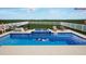 Enjoy a resort-style pool, spa, and lounge area that's perfect for entertaining at 3541 Great Banyan Way, Wesley Chapel, FL 33543