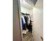 Well-organized closet with hanging clothes and shelves, providing practical storage in the home at 3725 Teeside Dr, New Port Richey, FL 34655