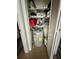Interior closet featuring shelving, supplies, and a hot water tank at 3725 Teeside Dr, New Port Richey, FL 34655