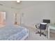 Comfortable bedroom space featuring a dedicated work-from-home desk area at 3816 N Maryland Ave, Plant City, FL 33565