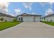 Charming one-story home with a spacious driveway and three-car garage at 3816 N Maryland Ave, Plant City, FL 33565
