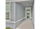 Welcoming front entryway with a stylish front door and attractive architectural details at 3816 N Maryland Ave, Plant City, FL 33565