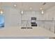 Beautiful kitchen with modern fixtures, center island, and ample counter space at 3816 N Maryland Ave, Plant City, FL 33565