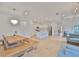 Bright open space with kitchen island, stainless appliances, and dining area at 3816 N Maryland Ave, Plant City, FL 33565