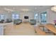 Open-concept living area with wood floors, recessed lighting, and ample natural light at 3816 N Maryland Ave, Plant City, FL 33565