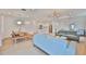 Open-concept living space with modern furnishings, a center kitchen island, and recessed lighting at 3816 N Maryland Ave, Plant City, FL 33565
