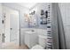 Cozy bathroom featuring a tub and shower, a sink with vanity, and neutral decor at 4028 Queen N St, St Petersburg, FL 33714