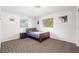 Cozy bedroom with natural lighting, a window view, and neutral decor at 4028 Queen N St, St Petersburg, FL 33714