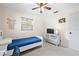 Light bedroom with white walls features neutral carpet, and natural light from the window at 4028 Queen N St, St Petersburg, FL 33714