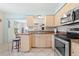 Beautiful kitchen featuring stainless steel appliances and ample cabinet space at 4028 Queen N St, St Petersburg, FL 33714